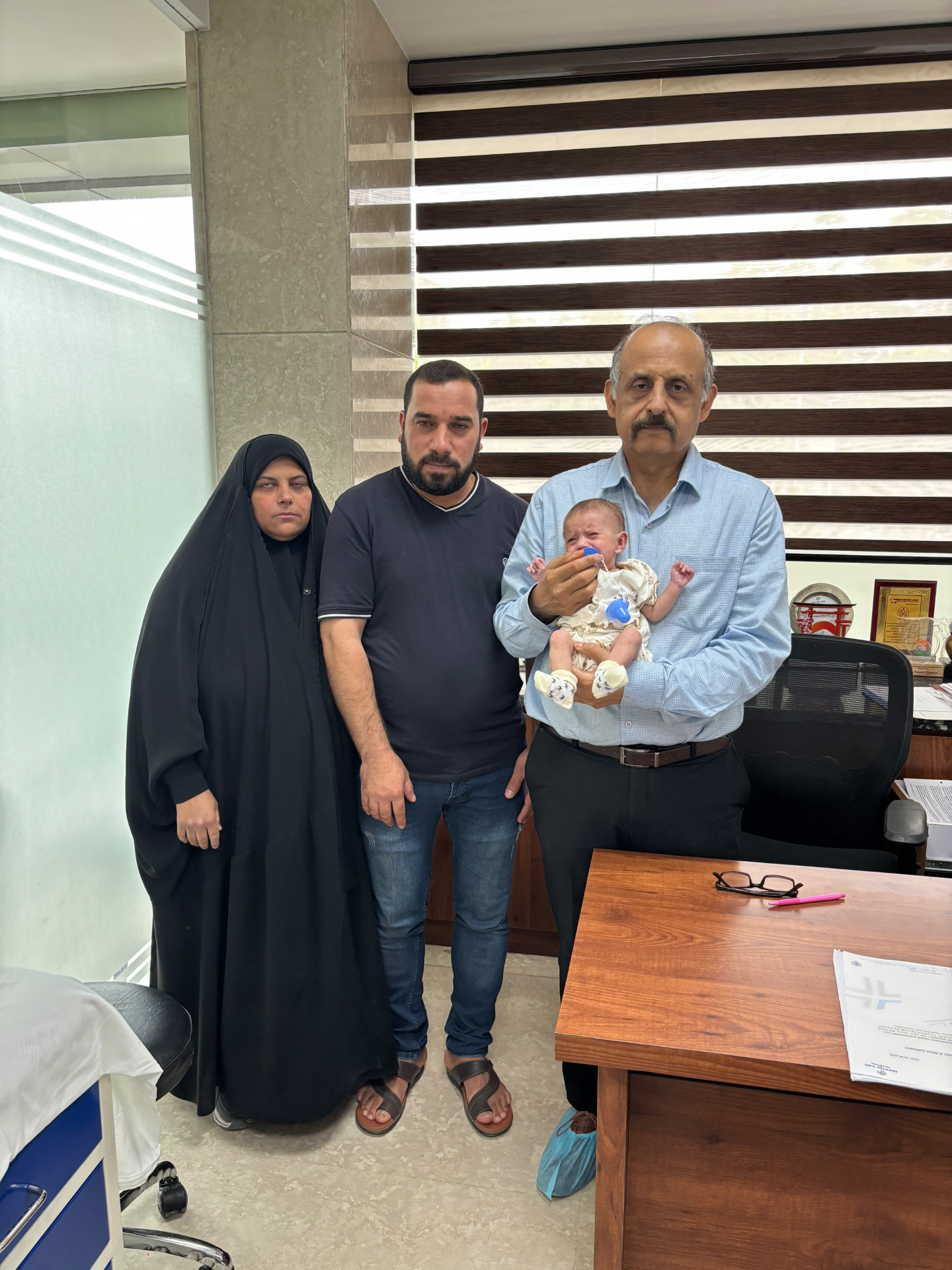 Iraqi family with newborn after successful treatment in India